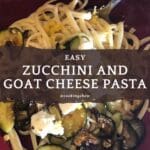 A bowl of pasta with zucchini, pasta, and goat cheese.