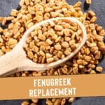 A rustic wooden scoop filled with fenugreek seeds, some of which have spilled onto the surface below.