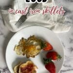 A well-seasoned cast iron skillet with freshly cooked eggs, ensuring a non-stick experience.