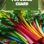 A close-up photo of a bunch of Swiss chard on a wooden cutting board.