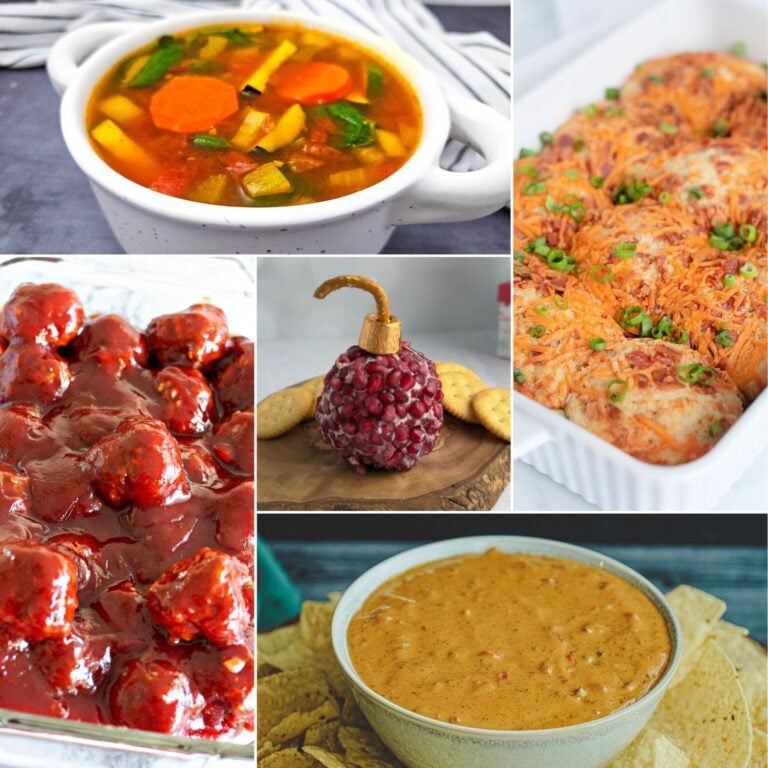 Hero shot of assorted fall appetizers like dips, crostini, and pumpkin-inspired bites on a rustic fall table.