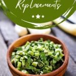 A photo of a bowl of chopped scallions on a wooden table.
