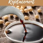 A photo of tamari sauce being poured to a white ceramic bowl