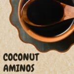A bowl of coconut aminos.