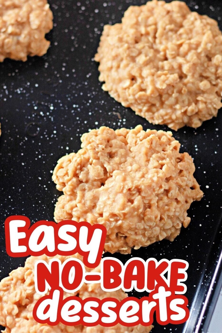 No bake peanut butter cookies sitting on a speckled black dish, made with oats, brown sugar and peanut butter