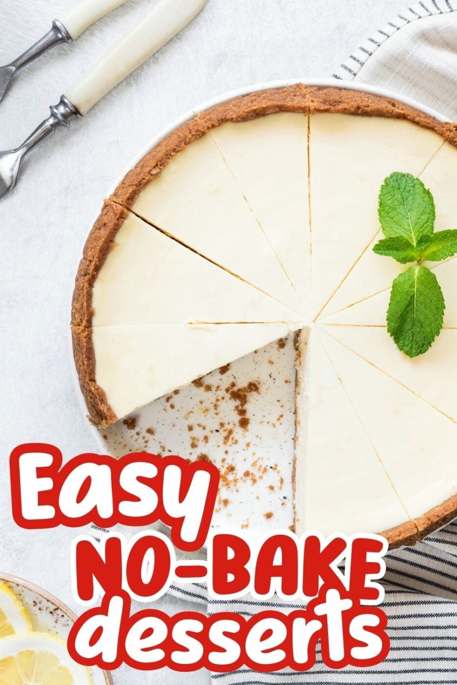 A top down view of a plain no bake cheesecake on a graham cracker crust with a sprig of mint garnish and a slice taken out of it.