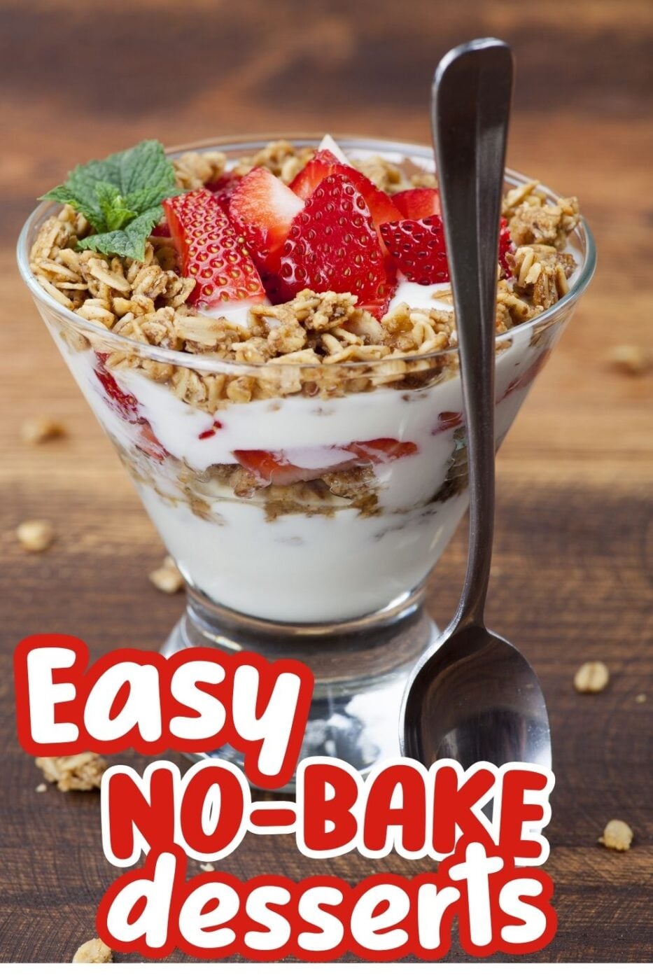 A layered strawberry yogurt dessert with granola and fresh berries