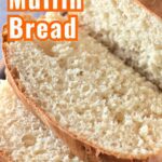 A slice of golden English muffin bread with a soft texture, fresh from the oven.