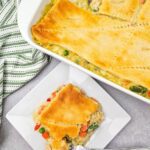 Hearty chicken and potato casserole topped with a crescent roll crust.
