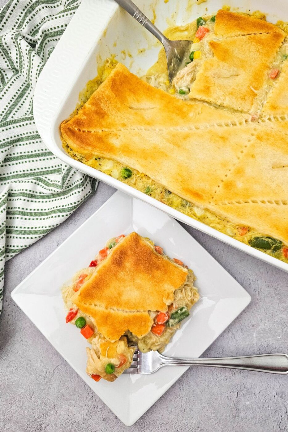 Hearty chicken and potato casserole topped with a crescent roll crust.