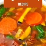 Healthy Moroccan soup served in white handled bowl on dark background.