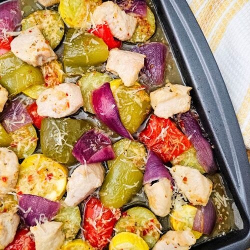 Sheet pan Italian chicken and veggies with roasted bell peppers, zucchini, squash, and parmesan