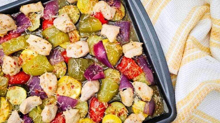 Sheet pan Italian chicken and veggies with roasted bell peppers, zucchini, squash, and parmesan