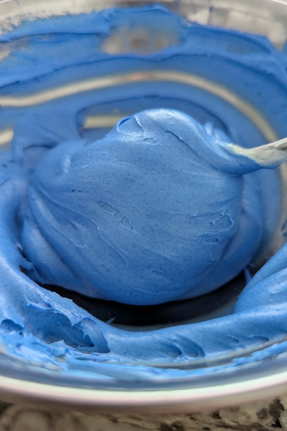 Smooth saturated blue chocolate coating ready for dipping or drizzling