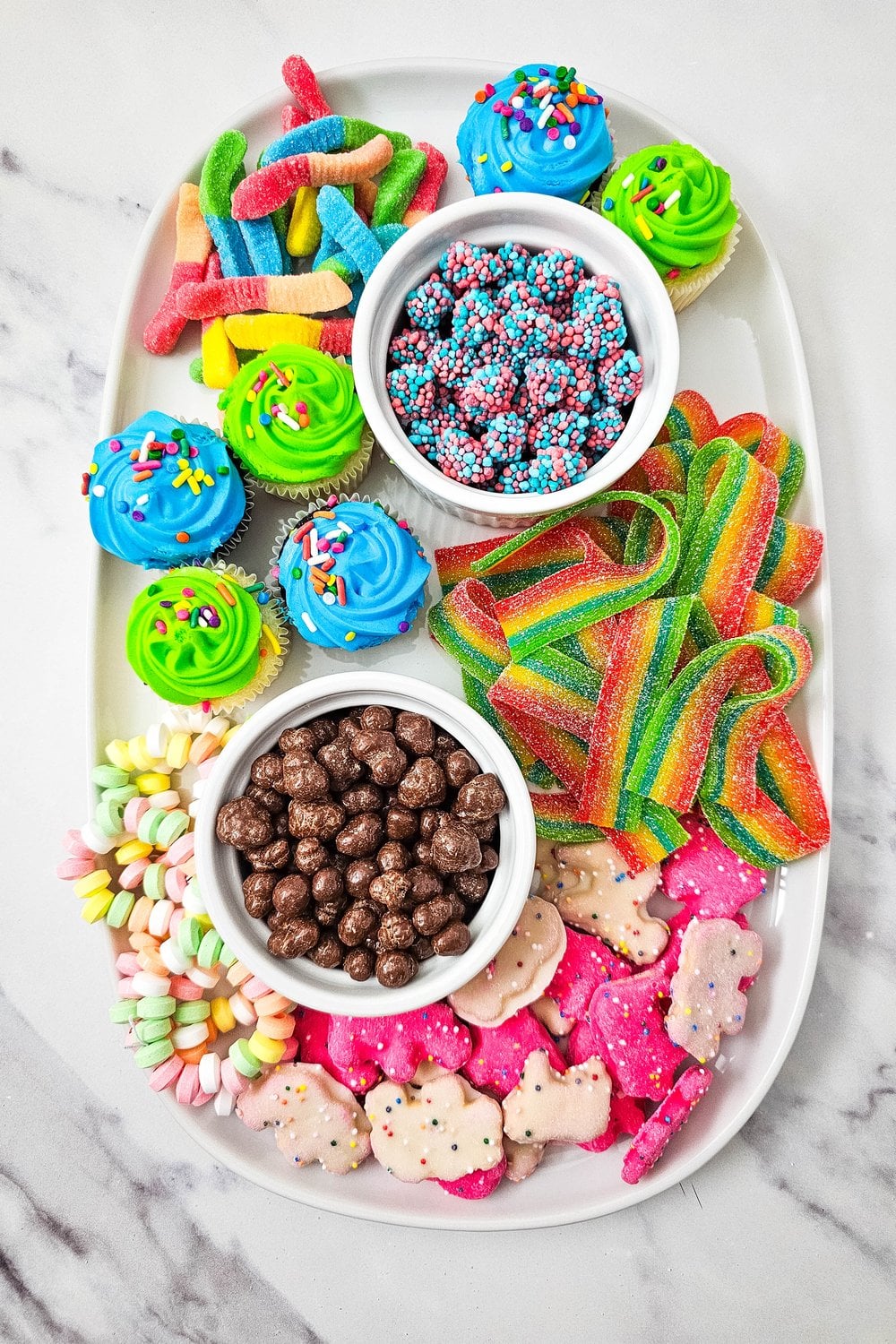 Mini cupcakes added to the kids birthday charcuterie board