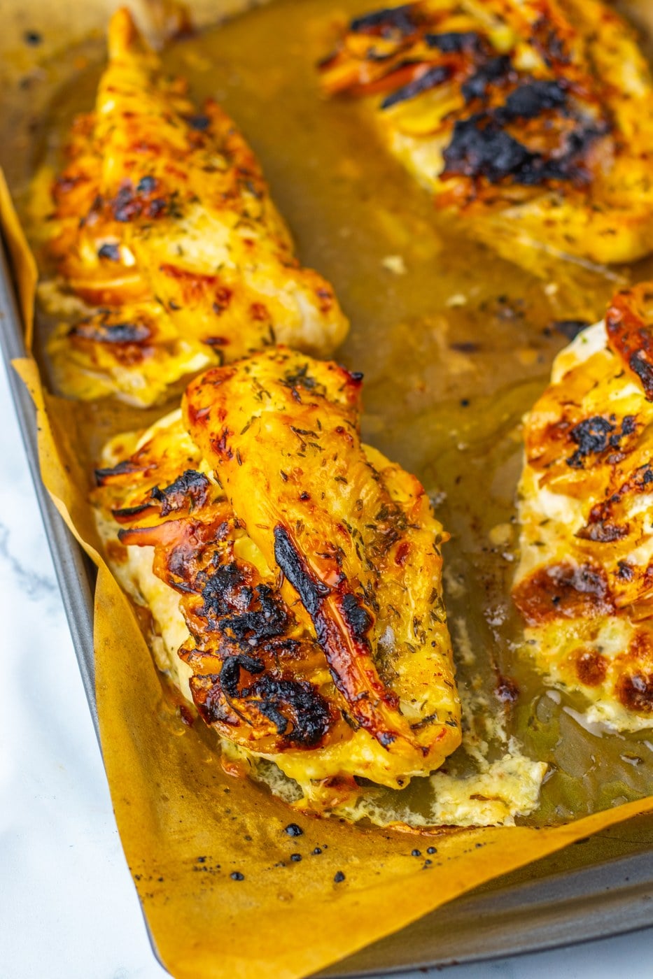 Maple glazed apple and brie stuffed chicken golden from the oven