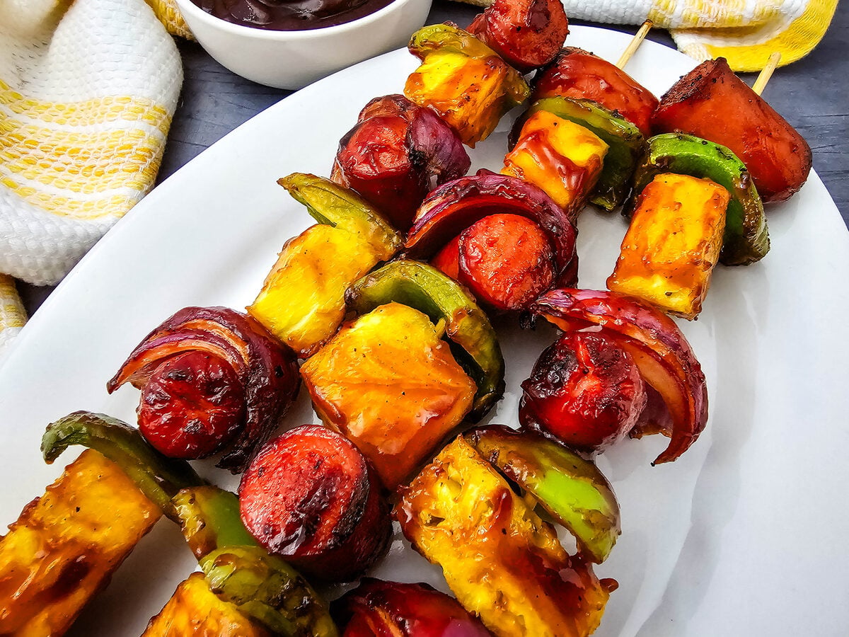 Grilled hot dog kabobs recipe on a white platter