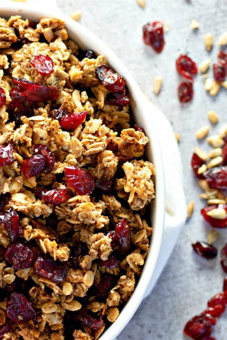 Homemade cranberry granola in a white bowl