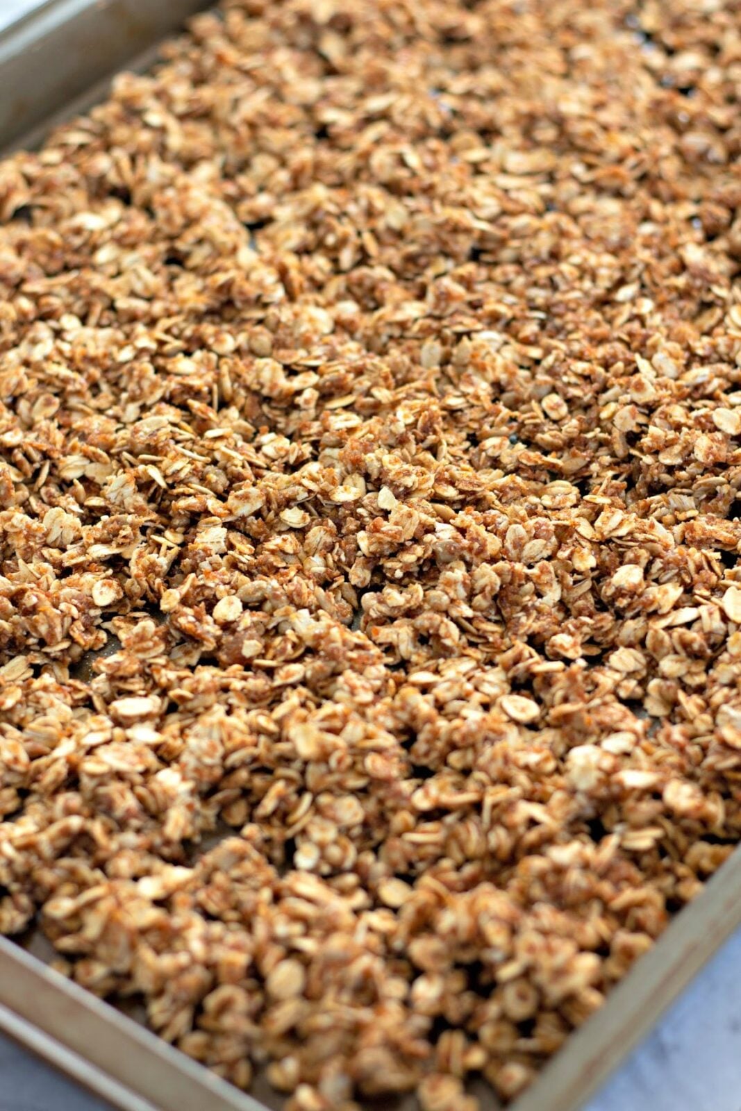 homemade cranberry granola adding cranberries