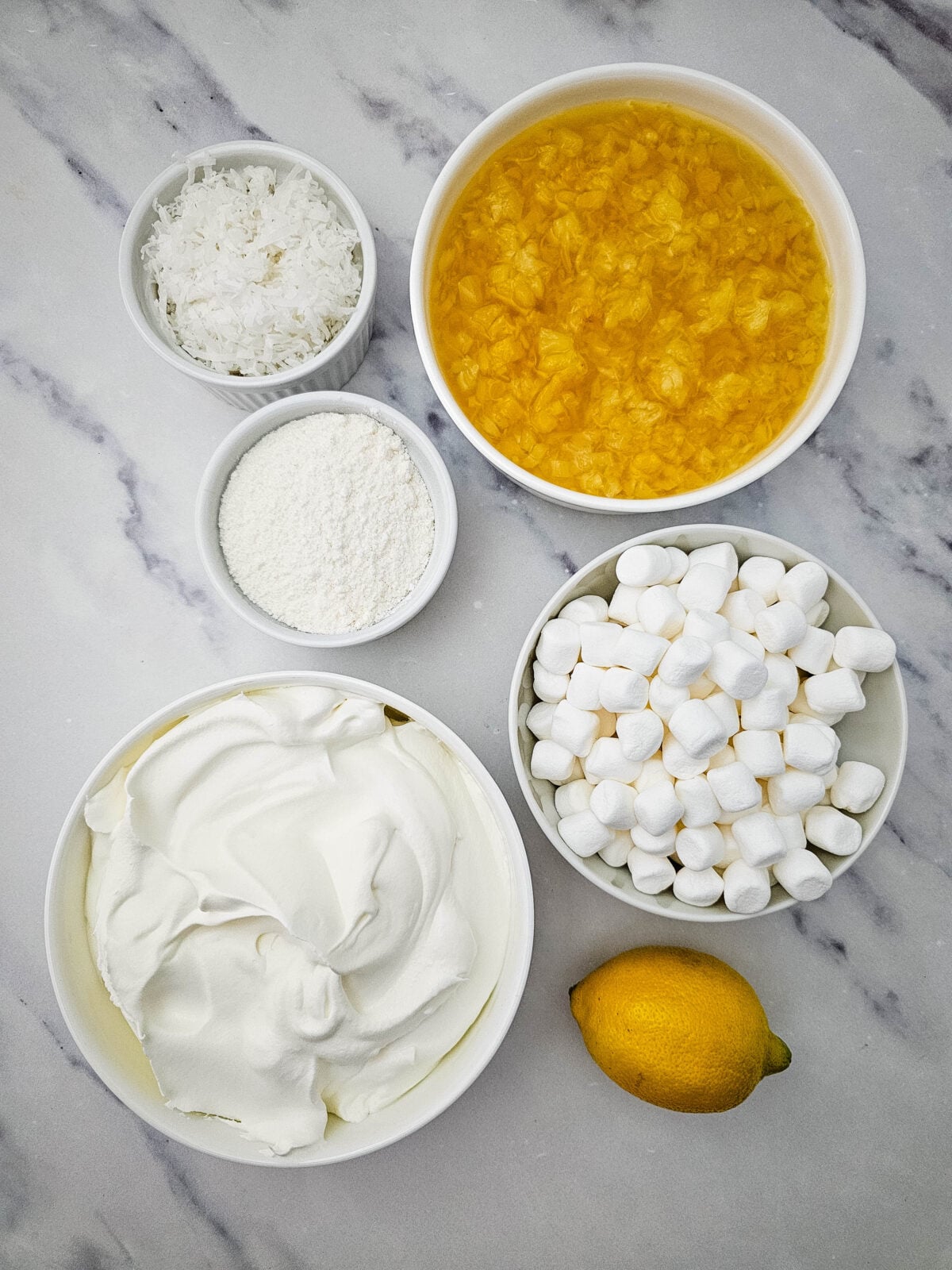 Ingredients for lemon fluff salad laid out on a counter