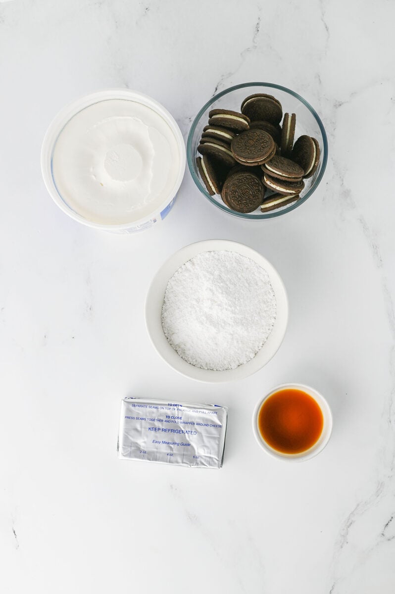 Oreo dip ingredients: cream cheese, powdered sugar, vanilla, Cool Whip, and Oreos