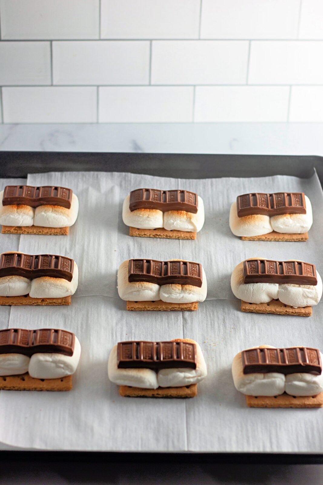 Chocolate melting on toasted marshmallows in the oven