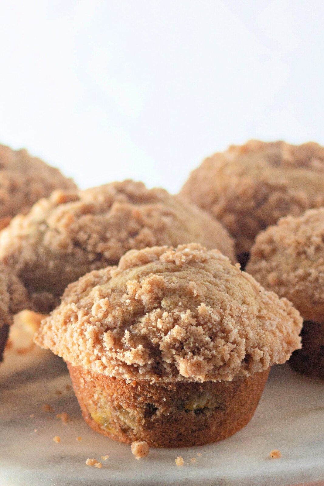 Peach streusel muffins cluster