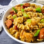 Closeup of a bowl containing jambalaya, a creole-style savory rice and sausage dish