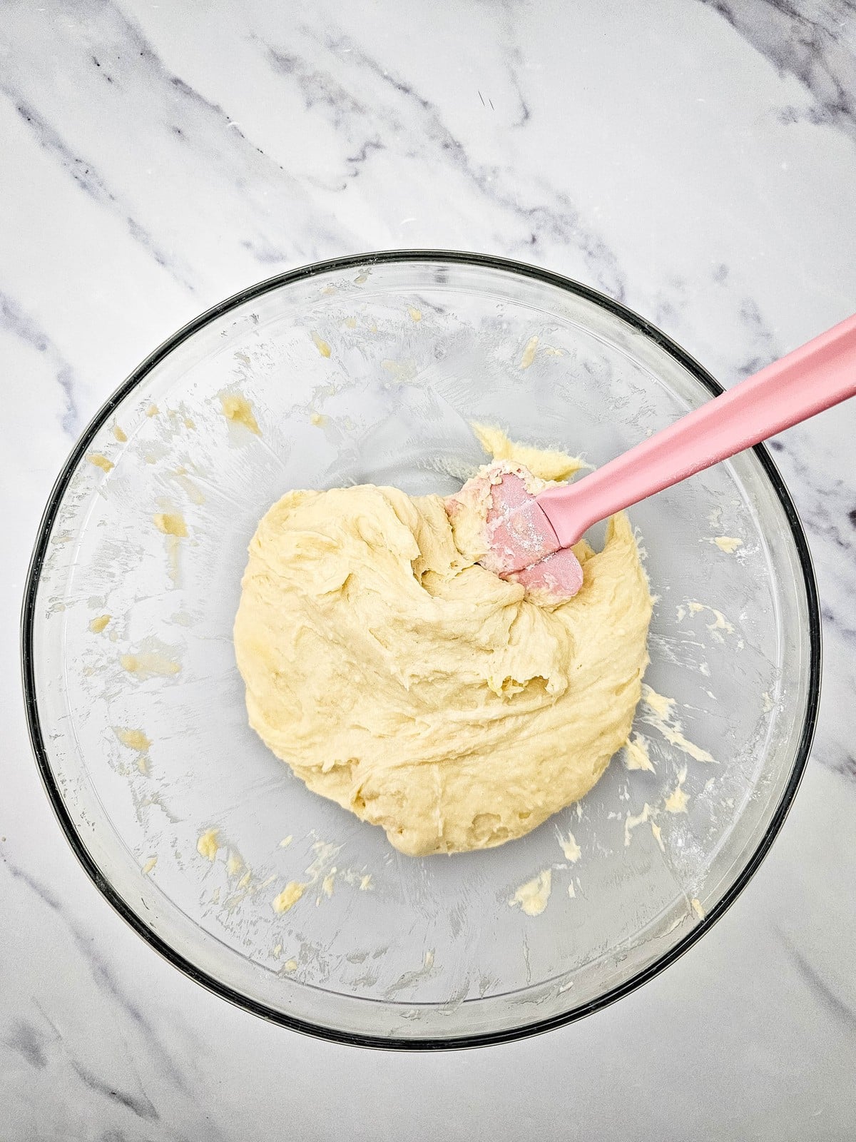 Smooth coffee cake batter in a glass bowl
