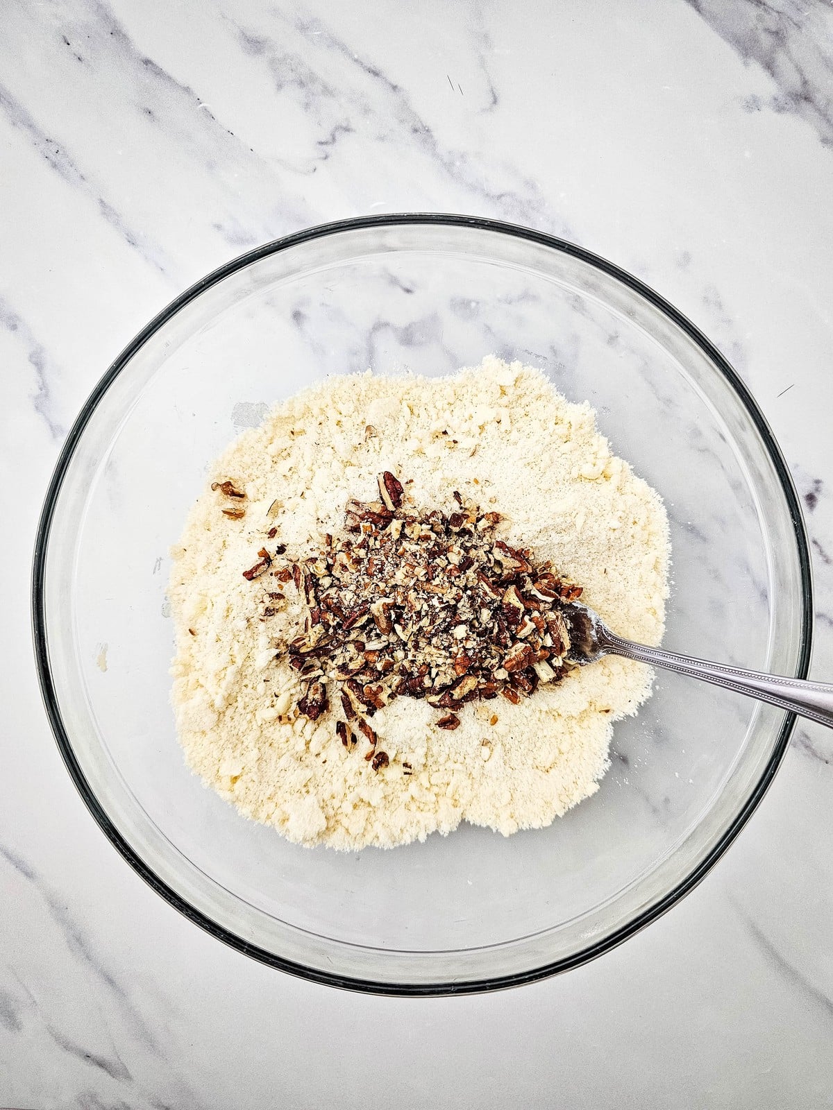 Chopped pecans added to the crumble topping