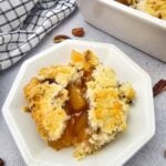 Easy apple crisp with apple pie filling topped with a pecan crumble