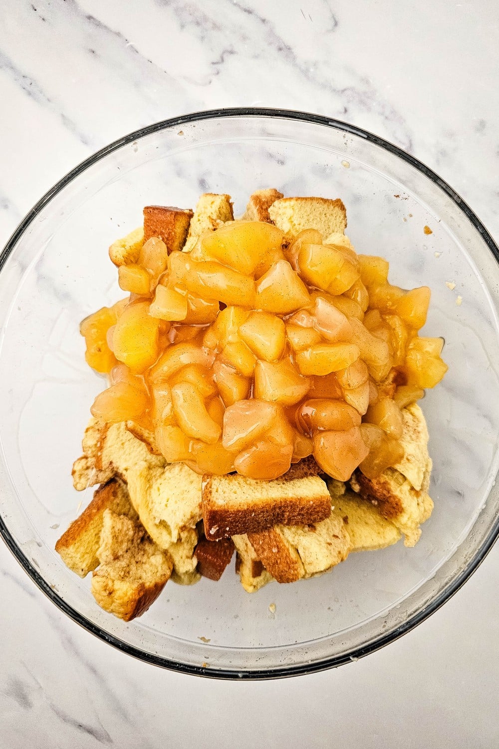 Chopped apple pie filling folded into the soaked brioche