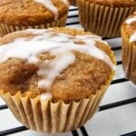 Easy apple pie filling muffins topped with a sweet glaze