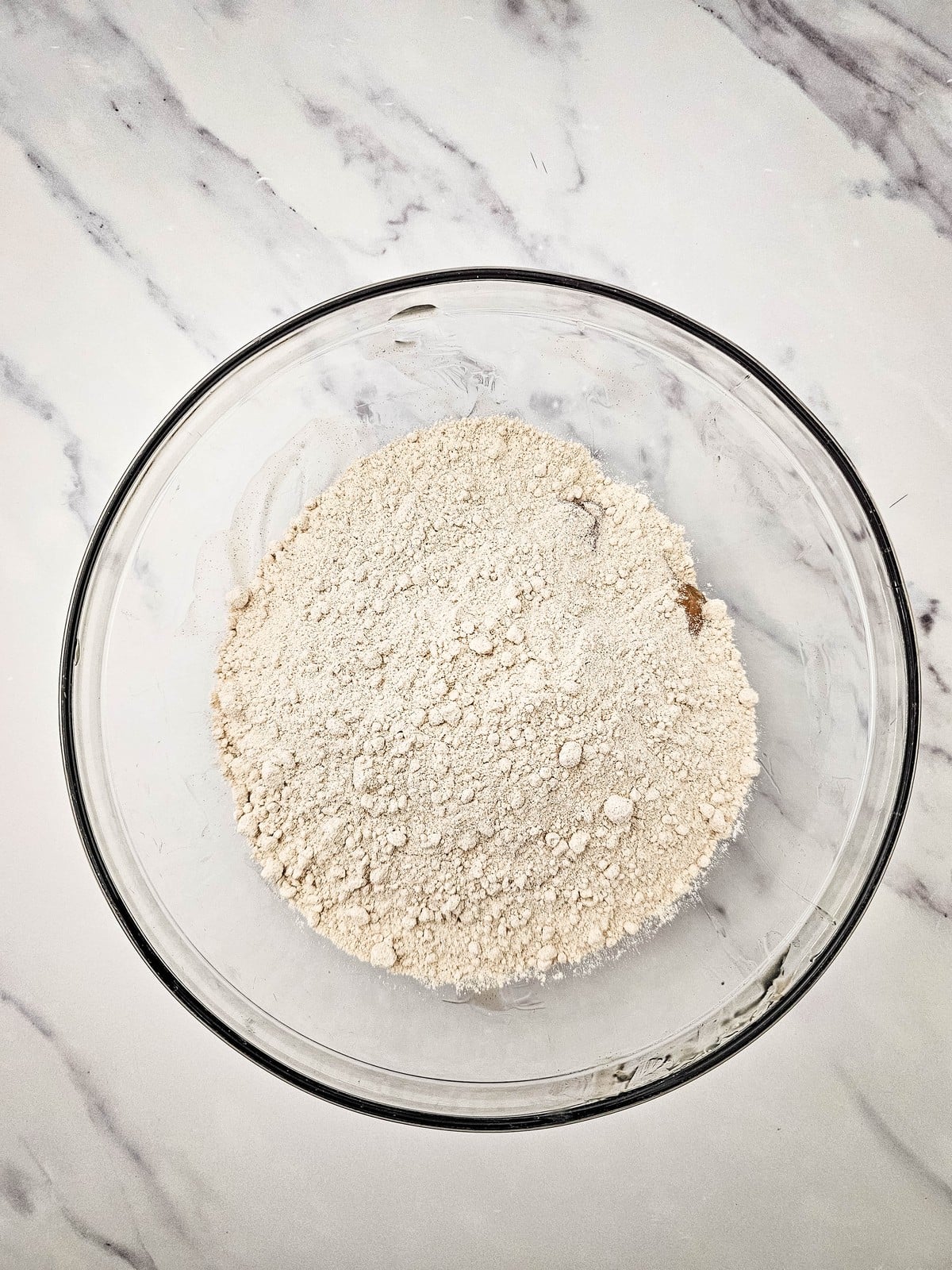 Spice cake mix added to a mixing bowl