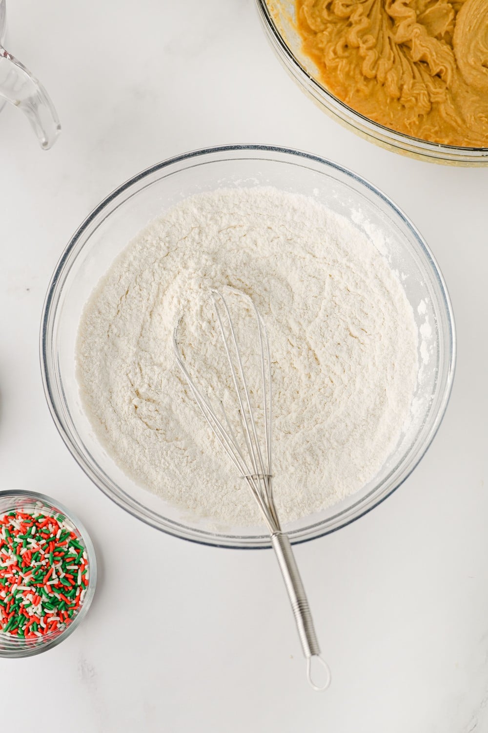 Flour, salt and baking powder whisked together in a glass bowl