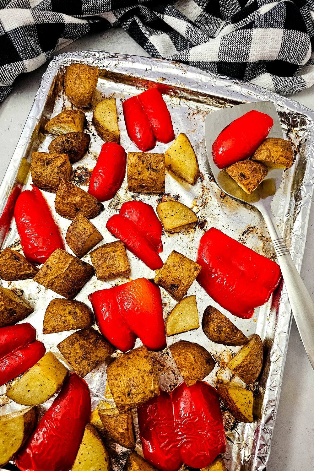 Easy roasted bell peppers and potatoes, close overhead of the finished sheet pan