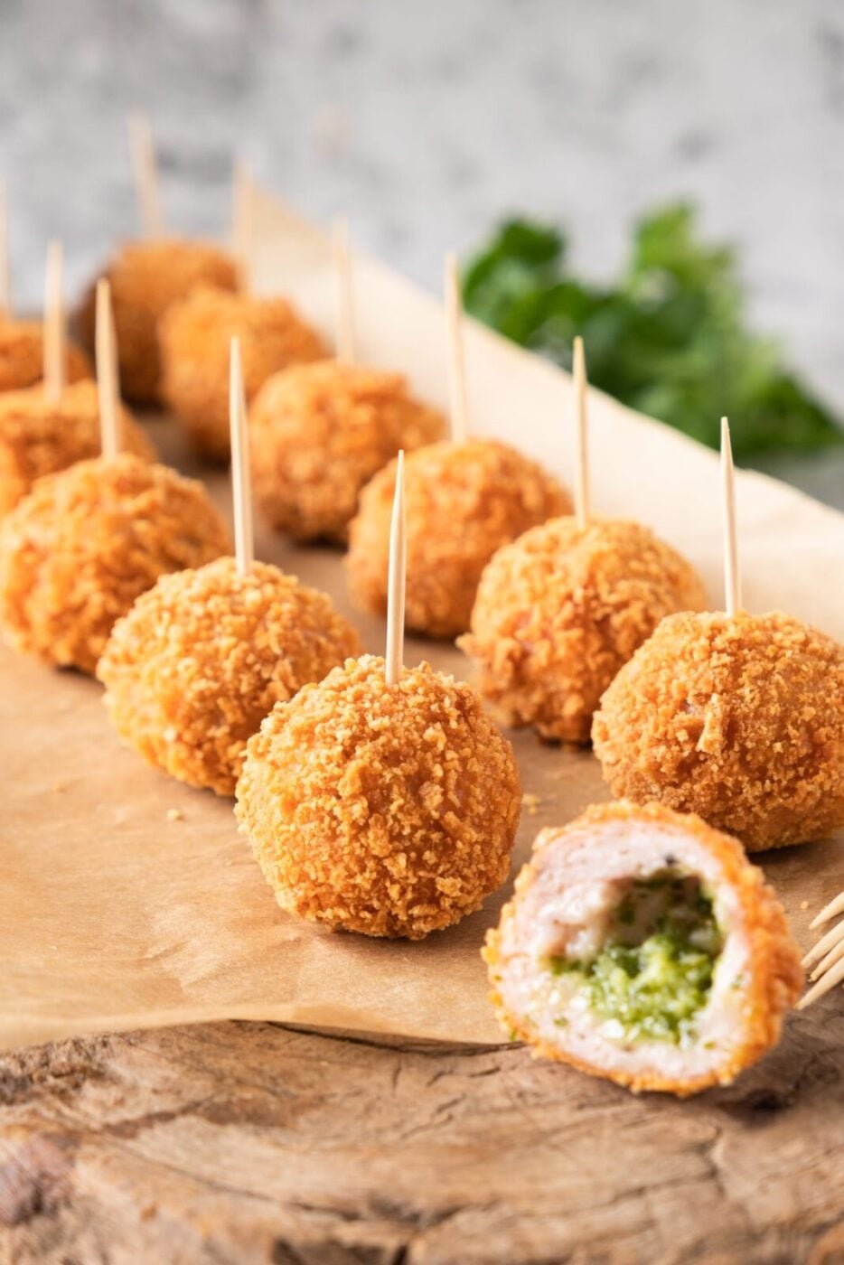 Garlic butter chicken balls served on toothpicks as party appetizers