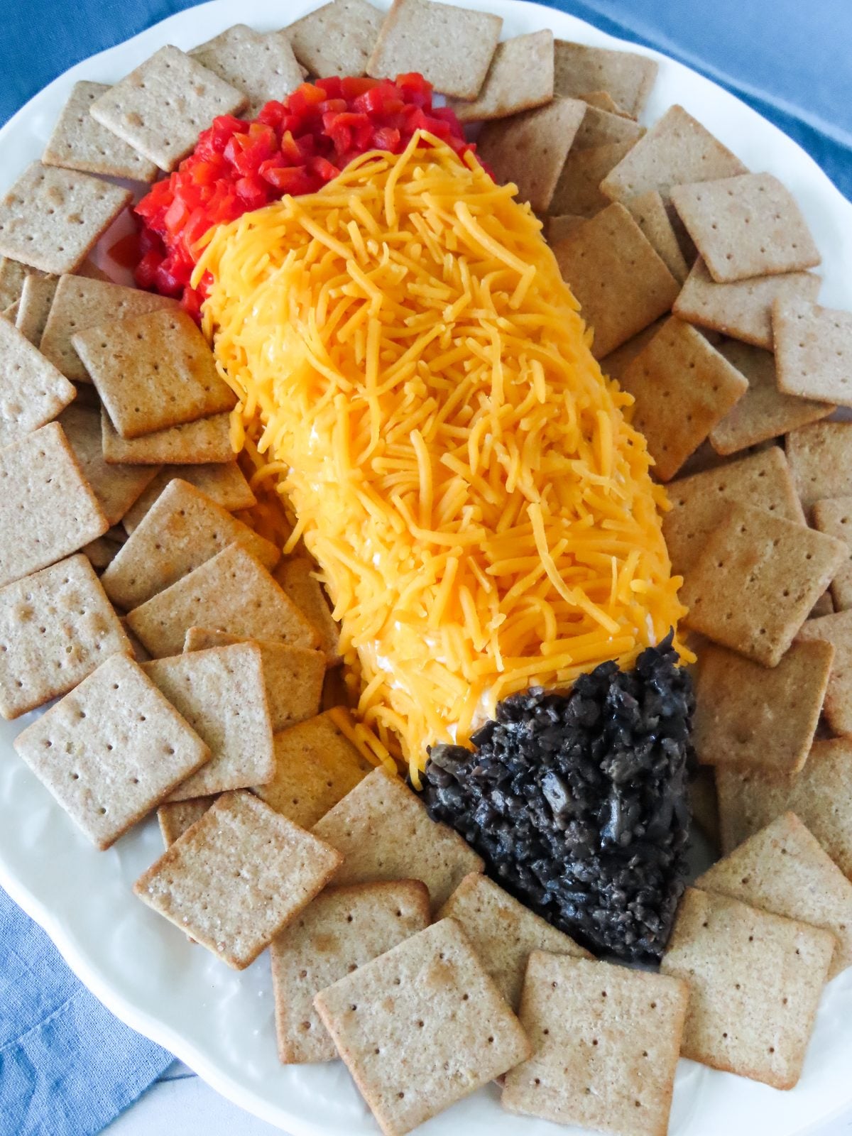 Pencil cheese ball back to school appetizer served with crackers