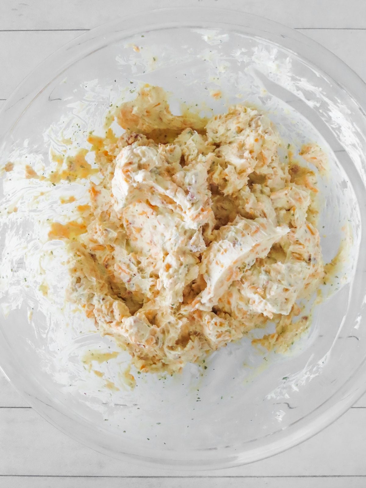 Cheese ball mixture combined in the mixing bowl