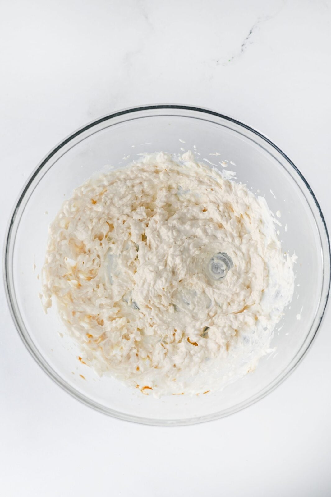 Butter and sour cream creamed together for the frosting base