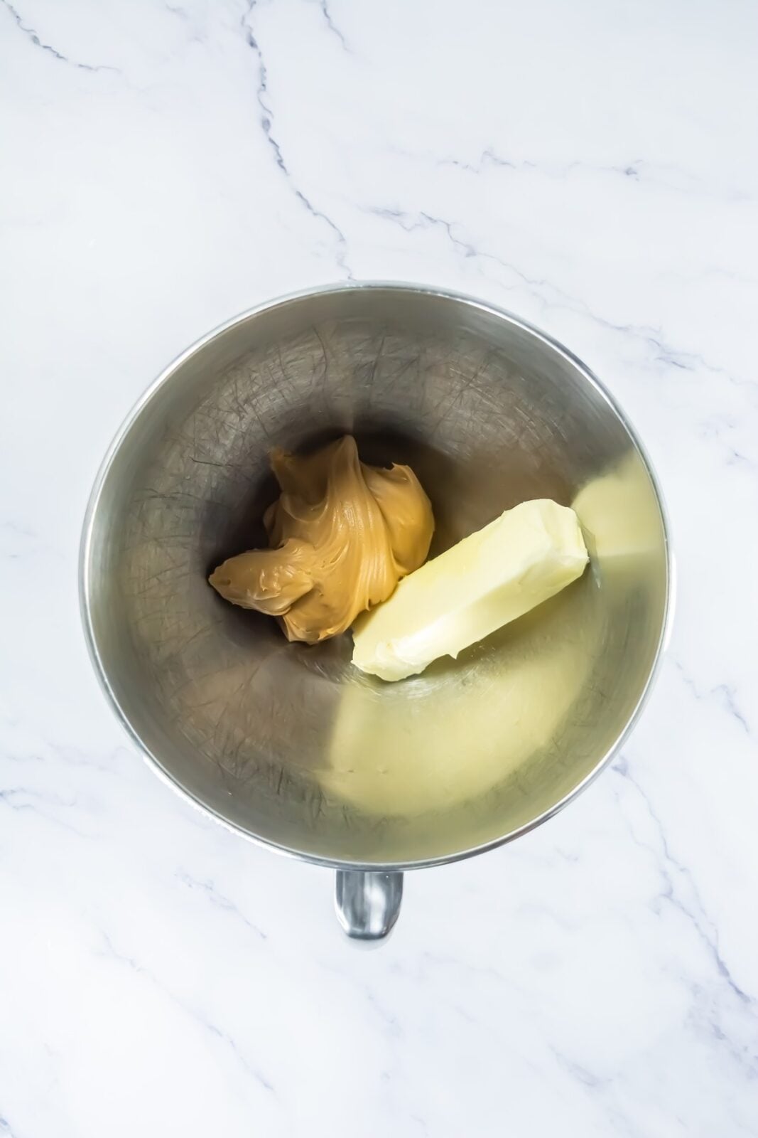 Peanut butter and softened butter in a stand mixer bowl for the filling