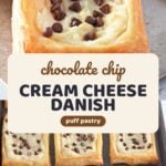 Golden puff pastry danishes topped with sweetened cream cheese and mini chocolate chips on a dark baking sheet