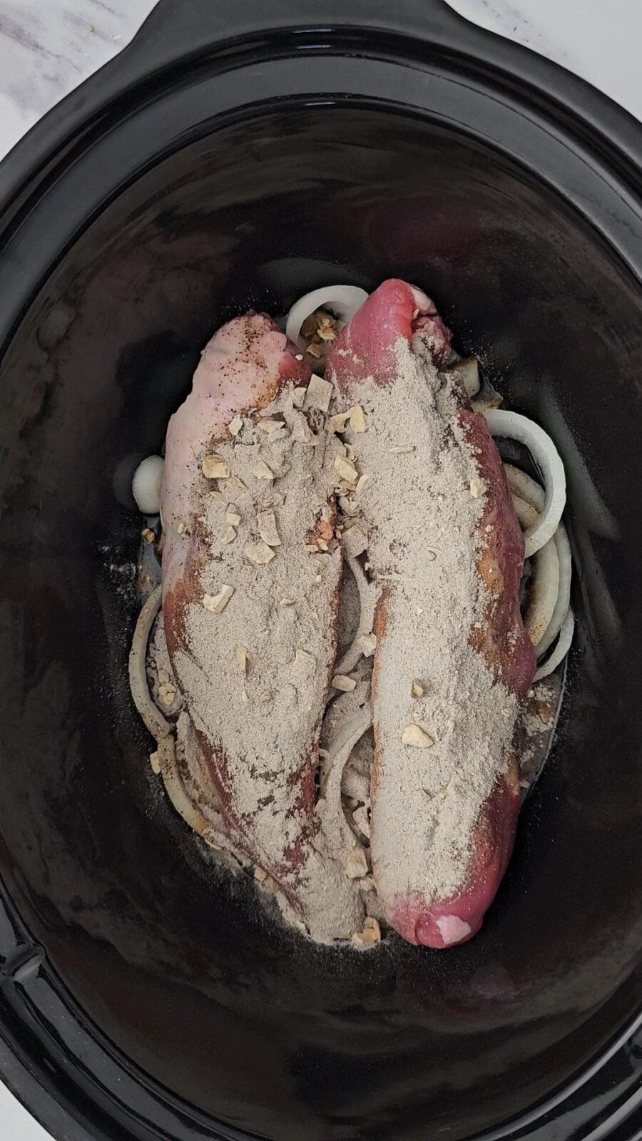 the dry mushroom gravy mix dusted over the top of the pork