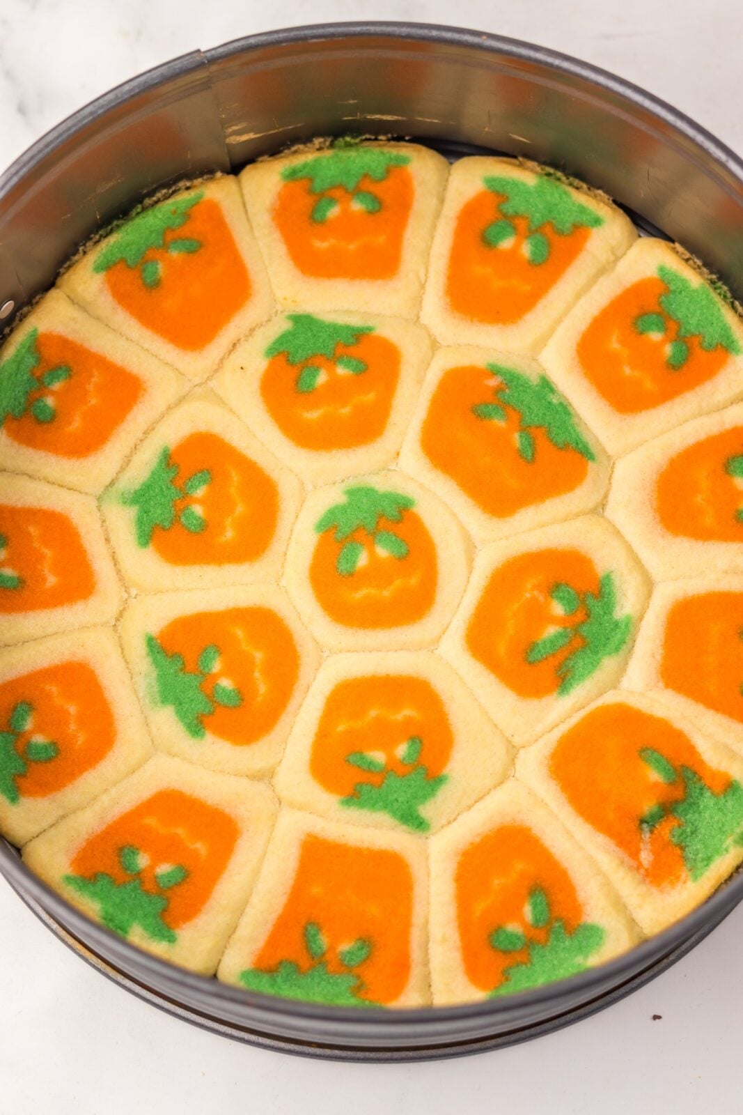 Baked Halloween sugar cookie crust golden in a springform pan