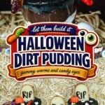 Chocolate pudding cups topped with cookie crumbs, gummy worms, candy eyes and cookie tombstones