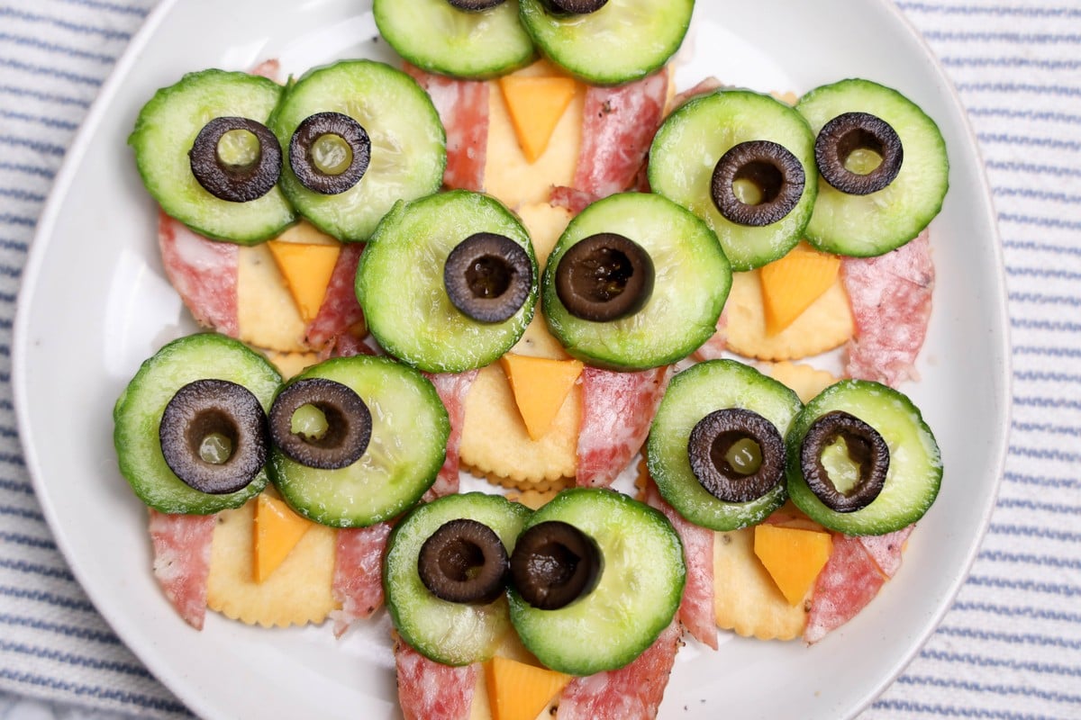 Owl crackers made with Ritz, salami, cheddar, cucumber, and black olives
