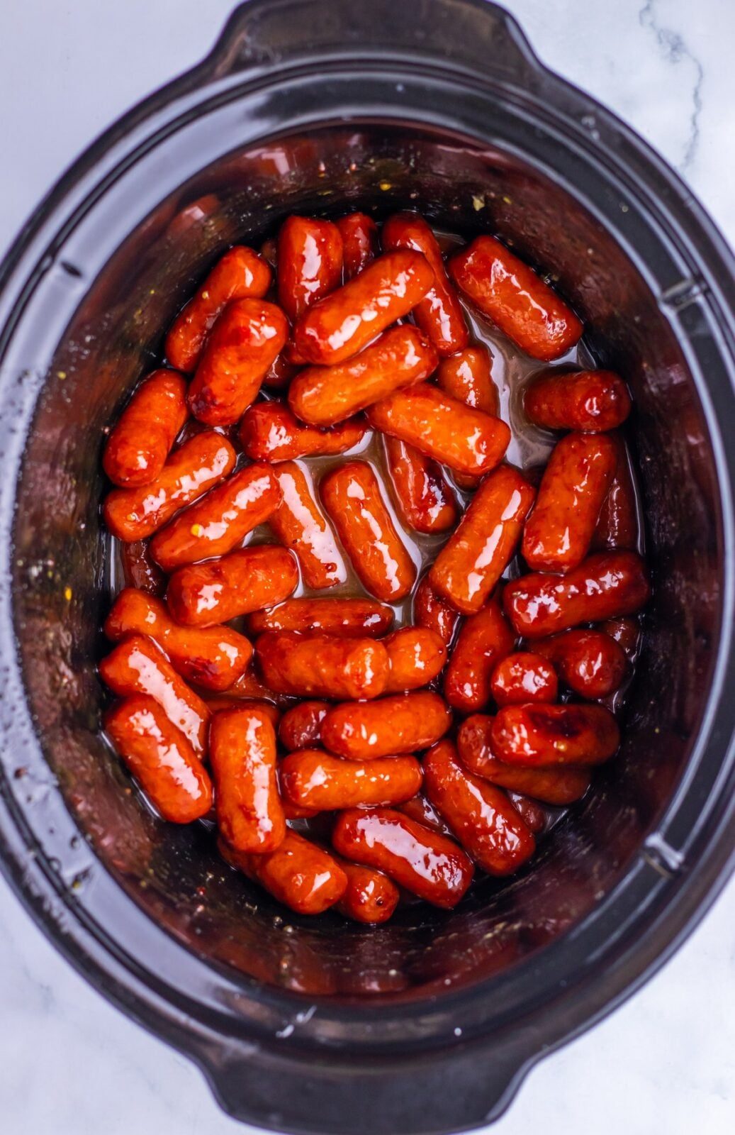 Slow Cooker Maple Dijon Lil Smokies process: cover and cook on LOW for 2 to 3 hours or HIGH for about 1 to 1 1/2 hours, stirring now and then so the sausages stay