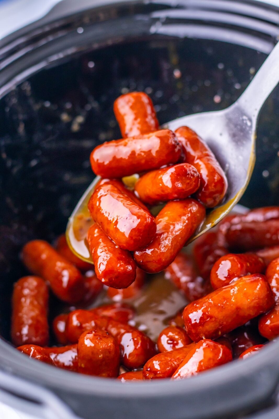 Slow Cooker Maple Dijon Lil Smokies process: when the sauce is hot, glossy, and a little thicker, switch the slow cooker to WARM and serve with toothpicks